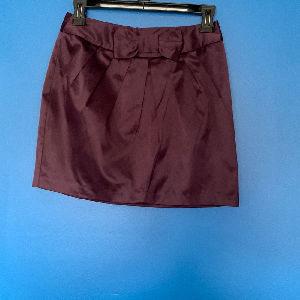 Forever 21 plum color faux satin mini skirt with bow at waist size small